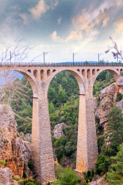istock Appearance of the bridge over. Stone bridge and train route 991368182