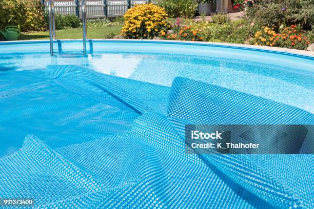 Swimming Pool Opened Cover Stock Photo - Download Image Now - Swimming Pool, Closing, Tarpaulin