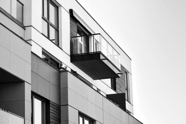 istock Modern apartment building exterior. Black and white. 991375686