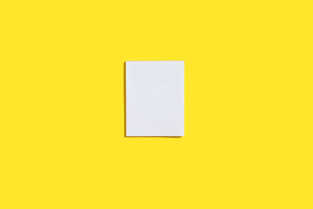 istock block of paper stickers on a yellow surface 991378776