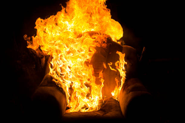 istock burned-out chair in a fire close-up on a black background 991380994