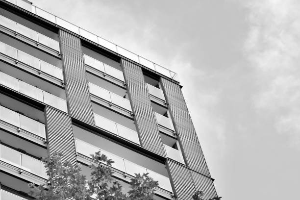 istock Modern apartment building exterior. Black and white. 991391890