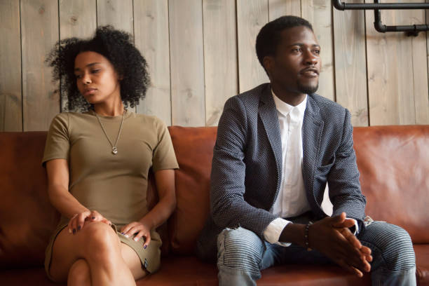 istock Black spouses sitting on couch aside not ready to compromise 991407060
