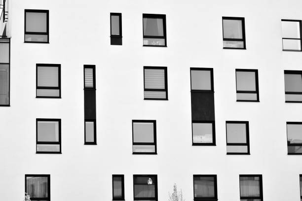istock Modern apartment building exterior. Black and white. 991407474
