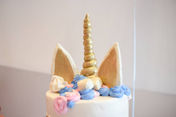 istock Sweet table and big cake for first birthday 991411478