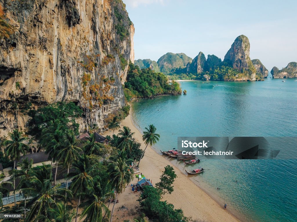 Cliffs by the Railay beach, Krabi province, Thailand Aerial high angle view of the sandy coastline near Railay beach, in the Krabi province, Thailand. Thailand Stock Photo