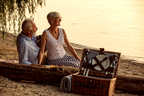istock Picnic on the beach has become their lifestyle 991413838