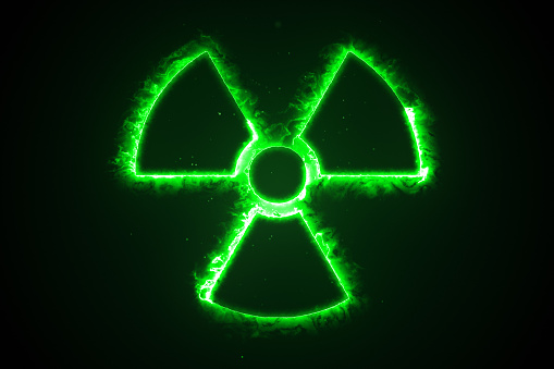 3d illustration of green fire or flow energy from nuclear and biohazard symbols.