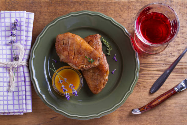 istock Duck breasts with  honey mustard sauce and thyme 991424566