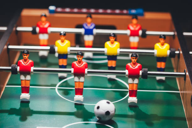 istock table football soccer game players (kicker) 991449628