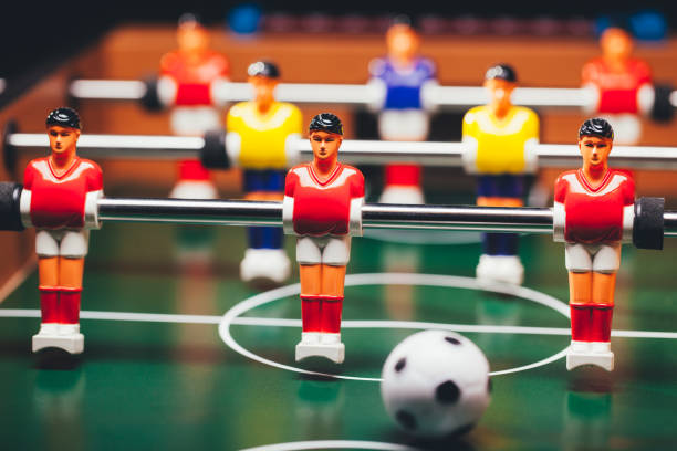 istock table football soccer game players (kicker) 991449828