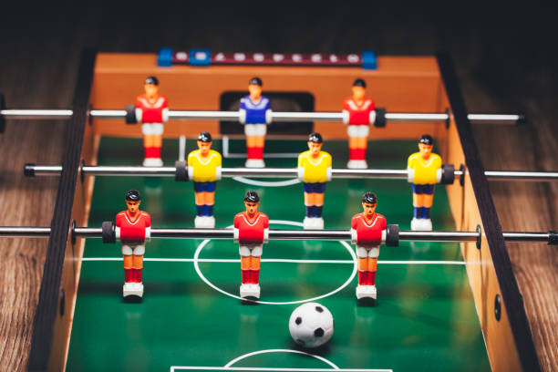 istock table football soccer game players (kicker) 991450288
