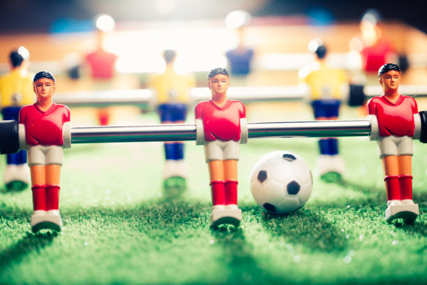 istock table football soccer game players (kicker) 991452916