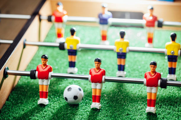 istock table football soccer game players (kicker) 991455098