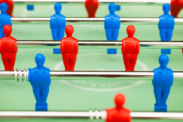 istock table football soccer game players (kicker) 991460596