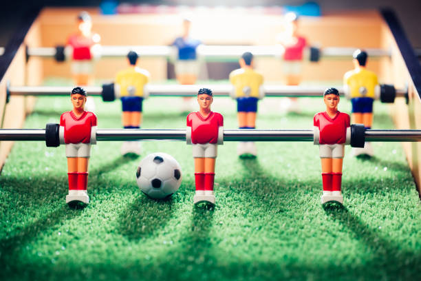 istock table football soccer game players (kicker) 991468520