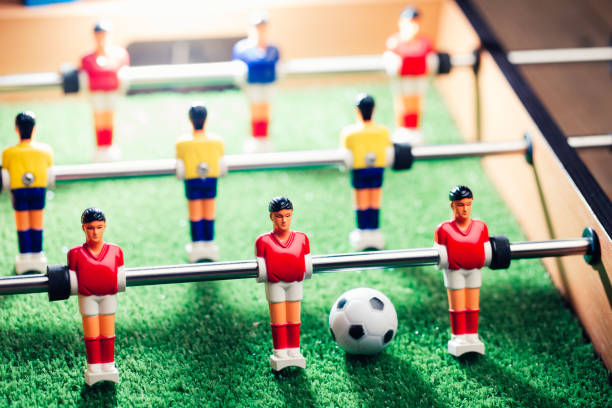 istock table football soccer game players (kicker) 991469766