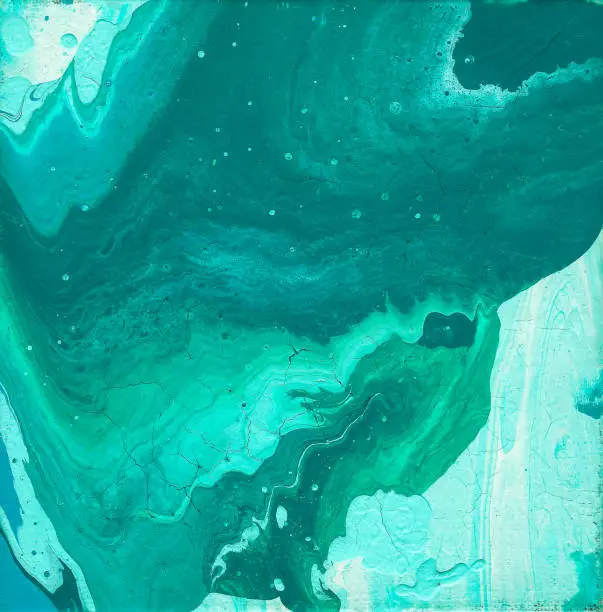 Photo of Teal, Turquoise, Blue, and Green Fluid Acrylic Abstract Painting with Copy Space