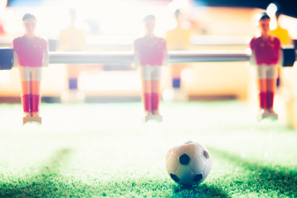 istock table football soccer game players (kicker) 991482038