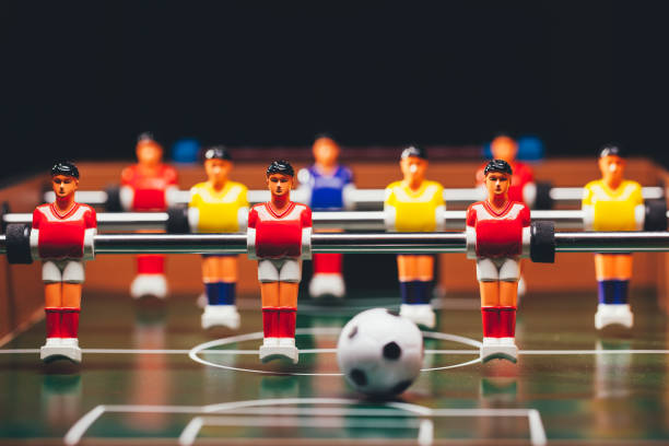 istock table football soccer game players (kicker) 991488992
