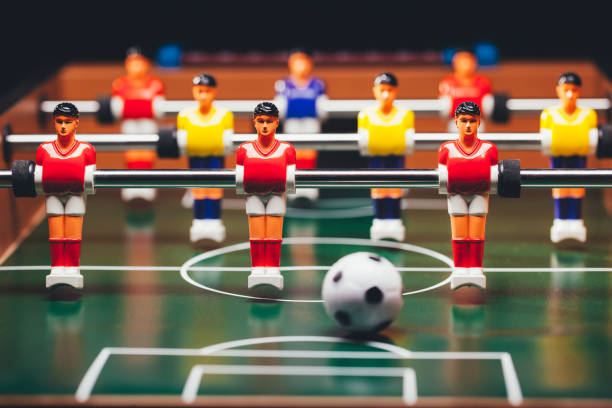istock table football soccer game players (kicker) 991489664