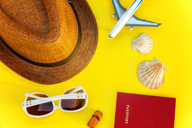 istock Concept of traveling on yellow background 991489674