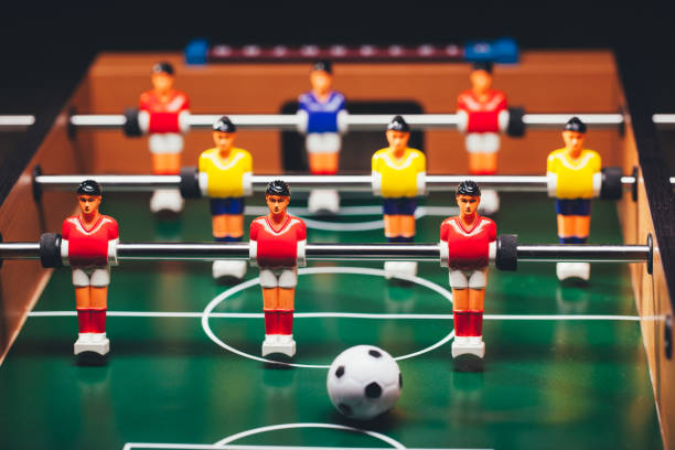 istock table football soccer game players (kicker) 991489898