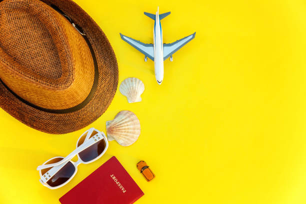 istock Concept of traveling on yellow background 991489992