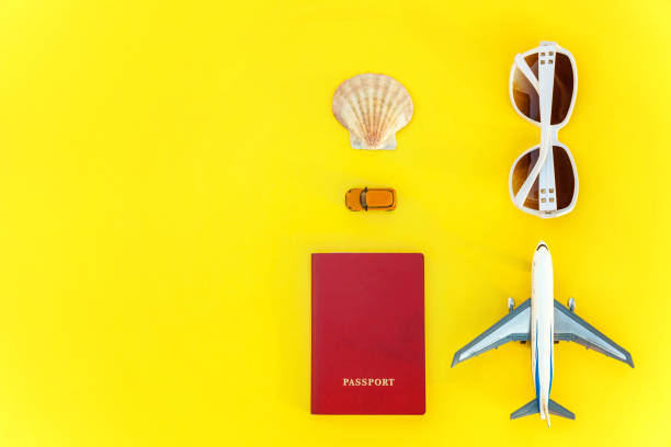 istock Concept of traveling on yellow background 991497040