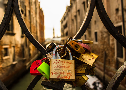 Some love padlocks on a bridge in Venice
