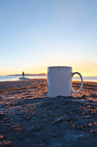 A long solo blank white coffee mug and the lone man