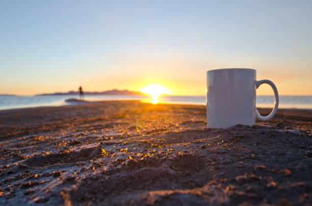 istock A lone man and a solo blank white coffee mug 991504552