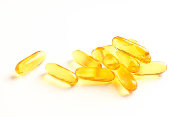 istock fish oil capsules isolated on white background 991547220