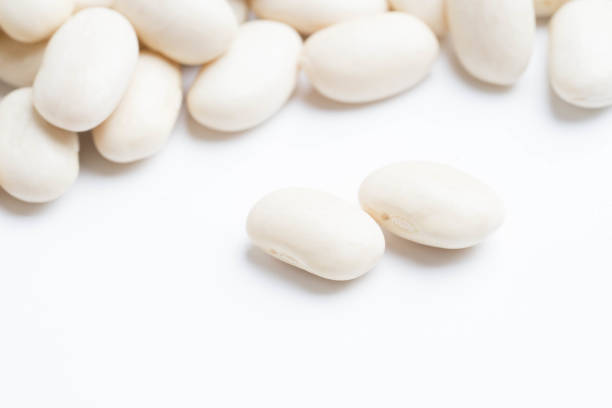 istock heap of white beans isolated on white background 991547344