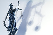 Lady Justice And Her Shadow