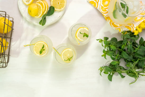 istock Fresh lemonade in a drinking glasses garnished 991563376