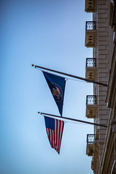 istock American and Utah State flags on building 991577654