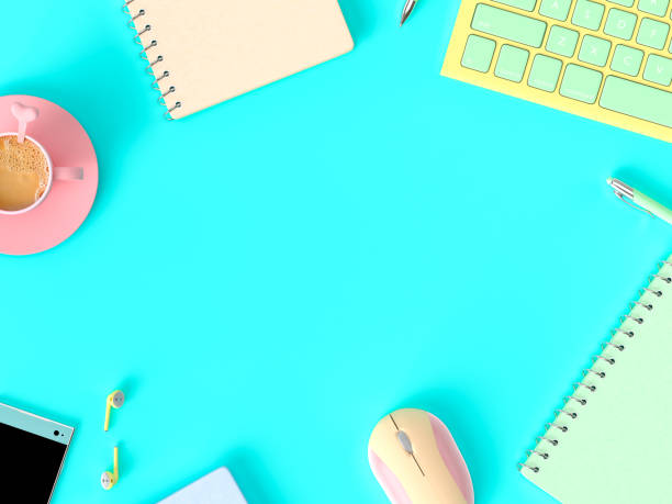 istock Coffee milk  in pink cup on work desk with notebook 991599296