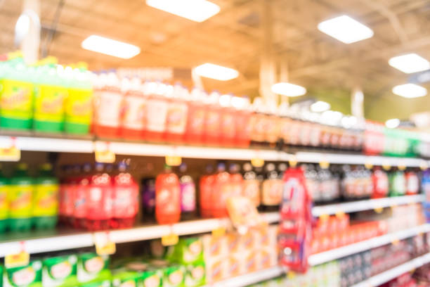 istock Abstract blurred soft drinks aisle in American store 991603462