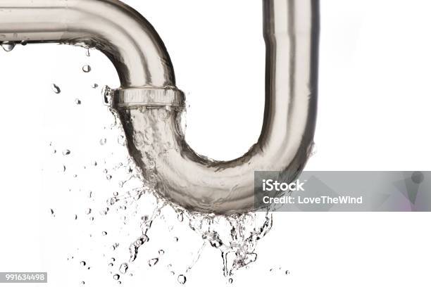 Water Leaking Or Splash From Pipe On Black Background Stock Photo - Download Image Now