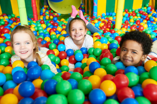 istock Cute Little Kids Playing in Ballpit 991816744