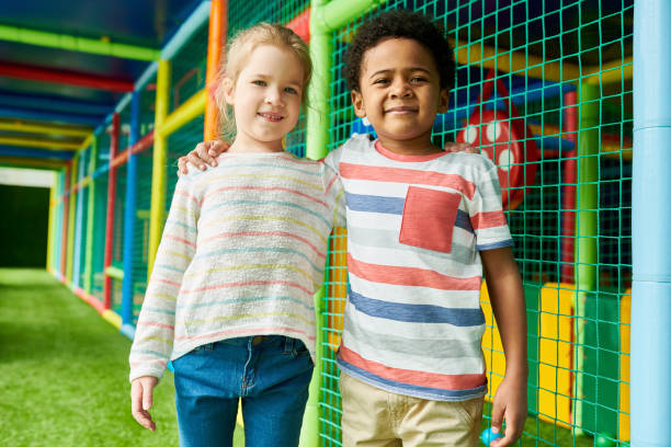 istock Cute Little Couple in Play Center 991816844