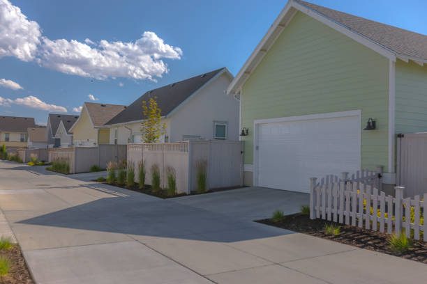 istock White picket fences on backside of homes 991816878