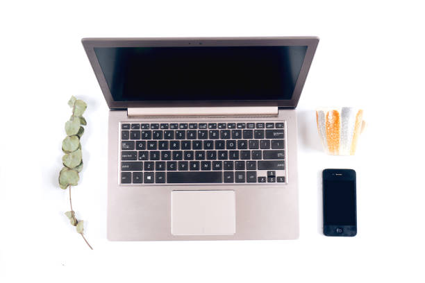 istock Business work place with cup of coffee,Empty workspace on white table. 991820474