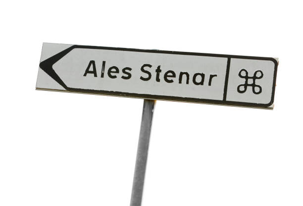 Signpost with direction to the Ale stones Signpost with direction to the stone ship Ales stones located near Kaseberga in the Swedish province of Scania. ales stenar stock pictures, royalty-free photos & images