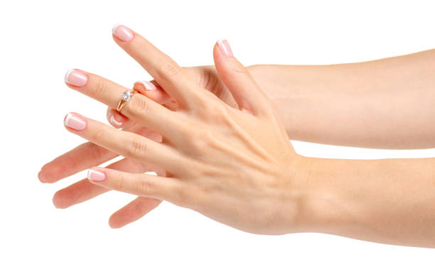 istock Female hand with a gold ring 991825136