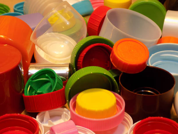 istock Ecology at work - various plastic bottle caps ready for recycling or designing 991832920