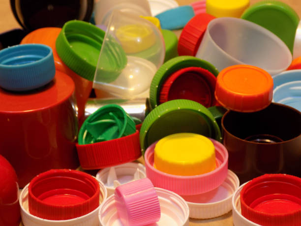 istock Ecology at work - various plastic bottle caps ready for recycling or designing 991832928