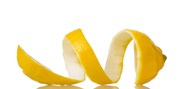 istock Spiral of lemon peel close up, isolated on white 991838246
