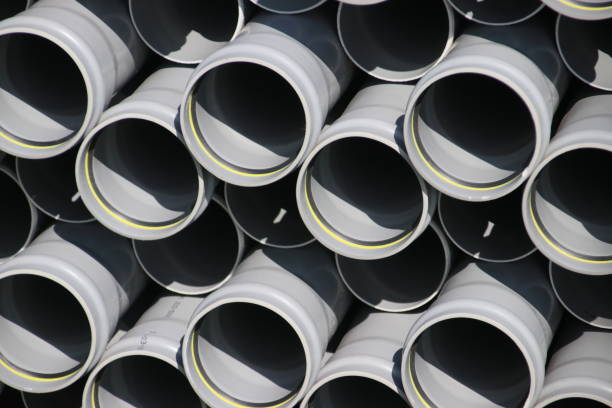istock Pile of PVC tubes waiting to be installed for a sewerage system 991851138